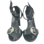 Front view of pre-owned Gucci Patent Leather Strappy Sandals in black, with adjustable buckle.